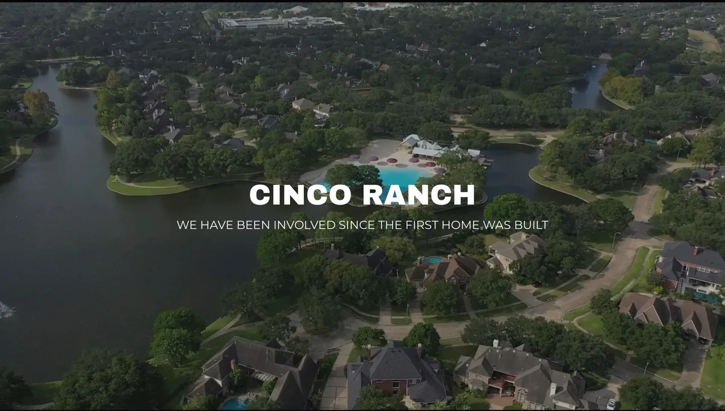 Cinco Ranch aerial view with the message We have been involved since the first home was built.