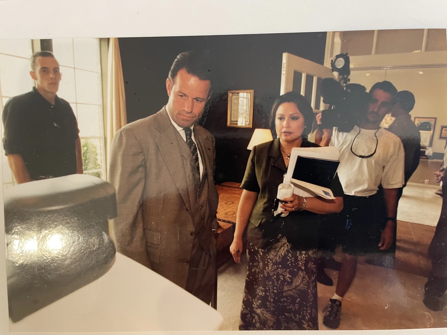 An archival connected-home demonstration with David Goswick and a television camera crew.