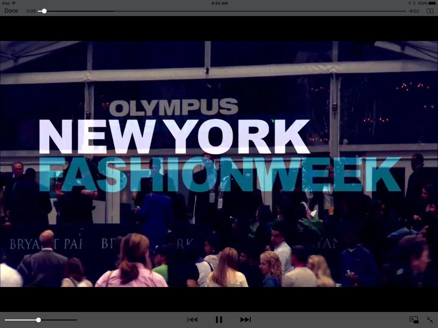 Crowd gathers at Olympus New York Fashion Week event.